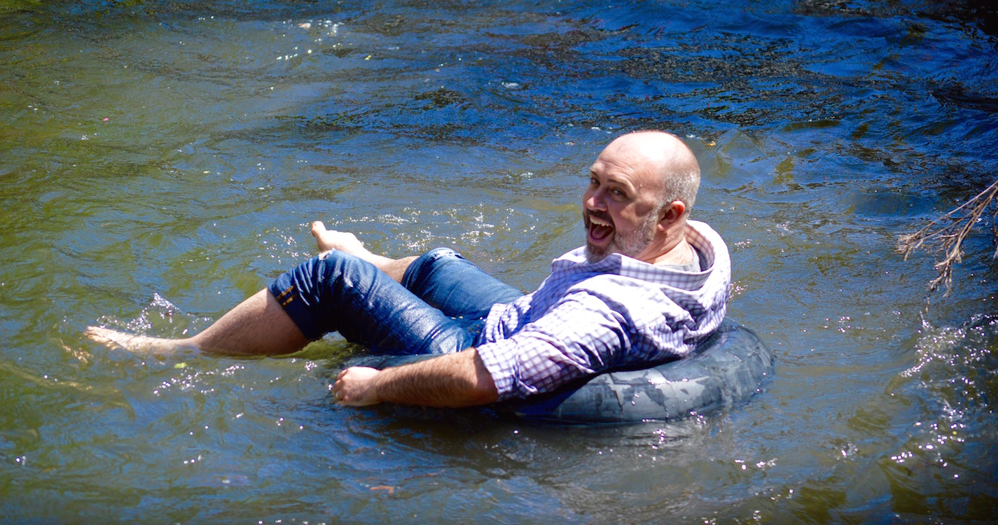 professor floats down the mill stream
