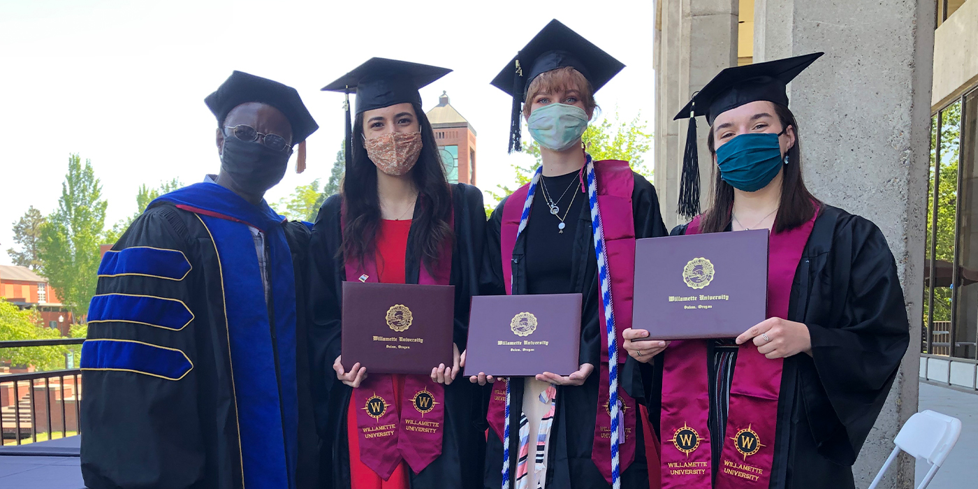 a professor and three graduates
