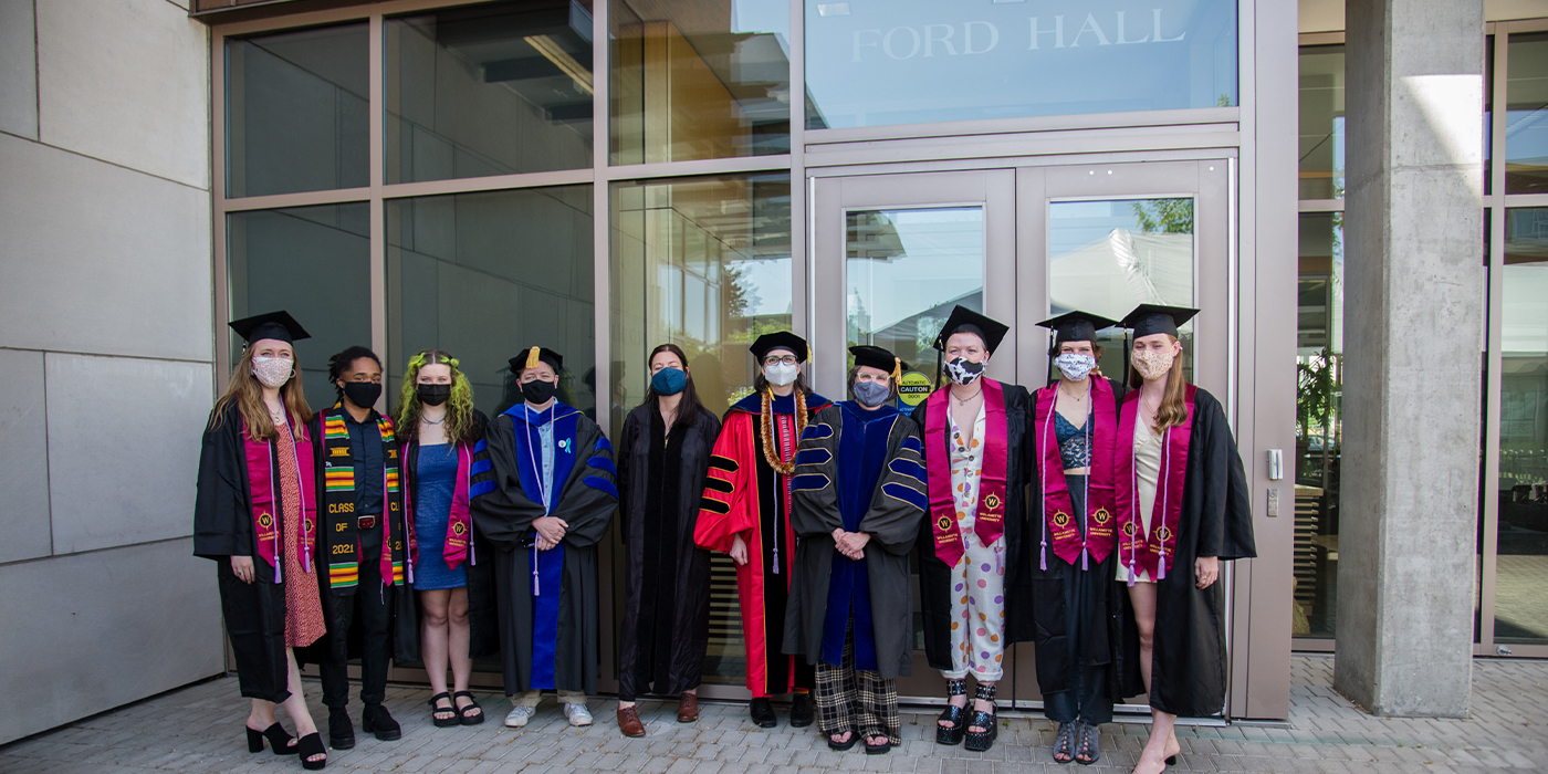 Women and Gender Studies graduates and faculty outside ford hall